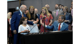 Kemp with a crowd of people