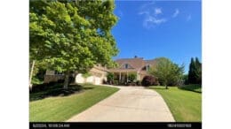 Luxury home at 2403 Wistful Way in Marietta’s Sprayberry High School zone, sold for $918,000 in January 2026, featuring a large two-story exterior and landscaped yard