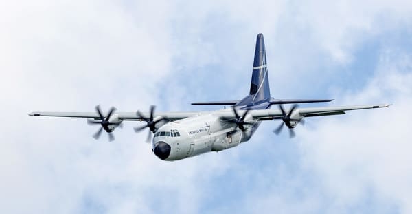 Lockheed Martin's LM-100J flies a Farnborough International Airshow practice run July 2. Lockheed Martin photo by Todd McQueen. (PRNewsfoto/Lockheed Martin Aeronautics Com)