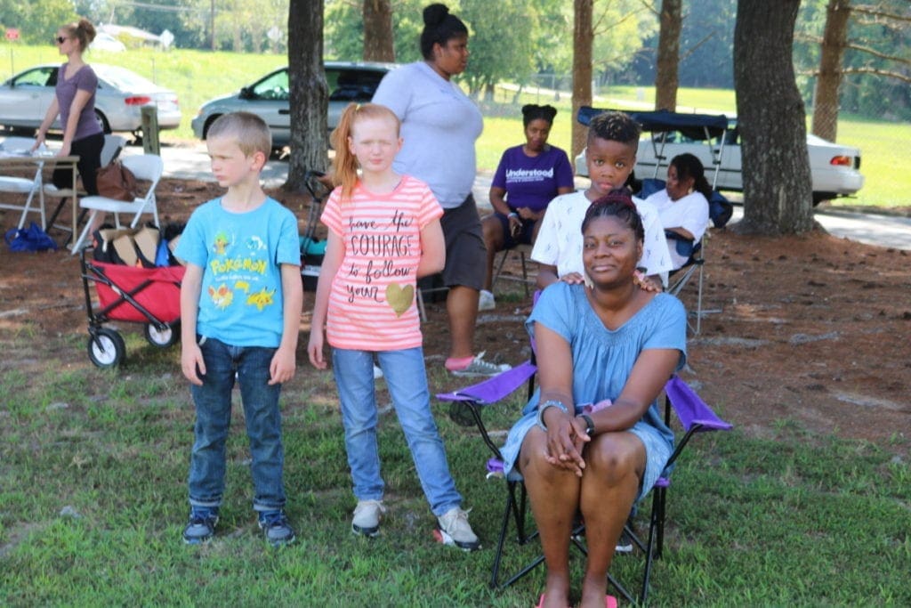 Residents wait for the signup table to open (photo by Larry Felton Johnson)